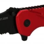 Fällkniv med låsning och bandskärare